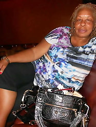 Sexy older female is masturbating herself