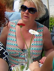 Fantastical mature mademoiselle is getting undressed on picture